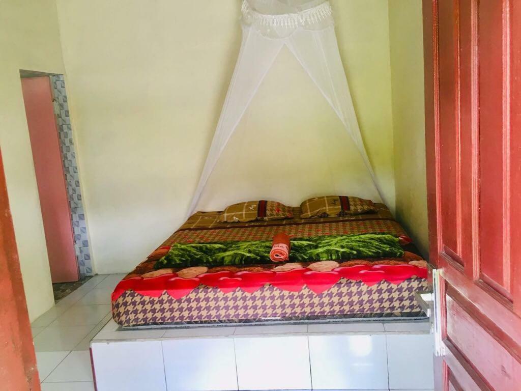 Sahnan Guest House Bukit Lawang Esterno foto