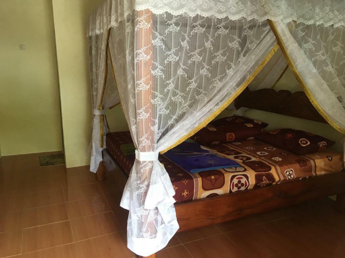 Sahnan Guest House Bukit Lawang Esterno foto