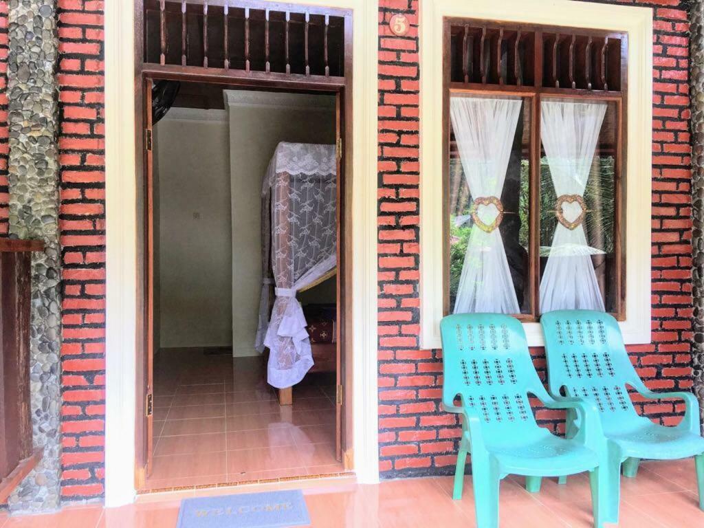 Sahnan Guest House Bukit Lawang Esterno foto
