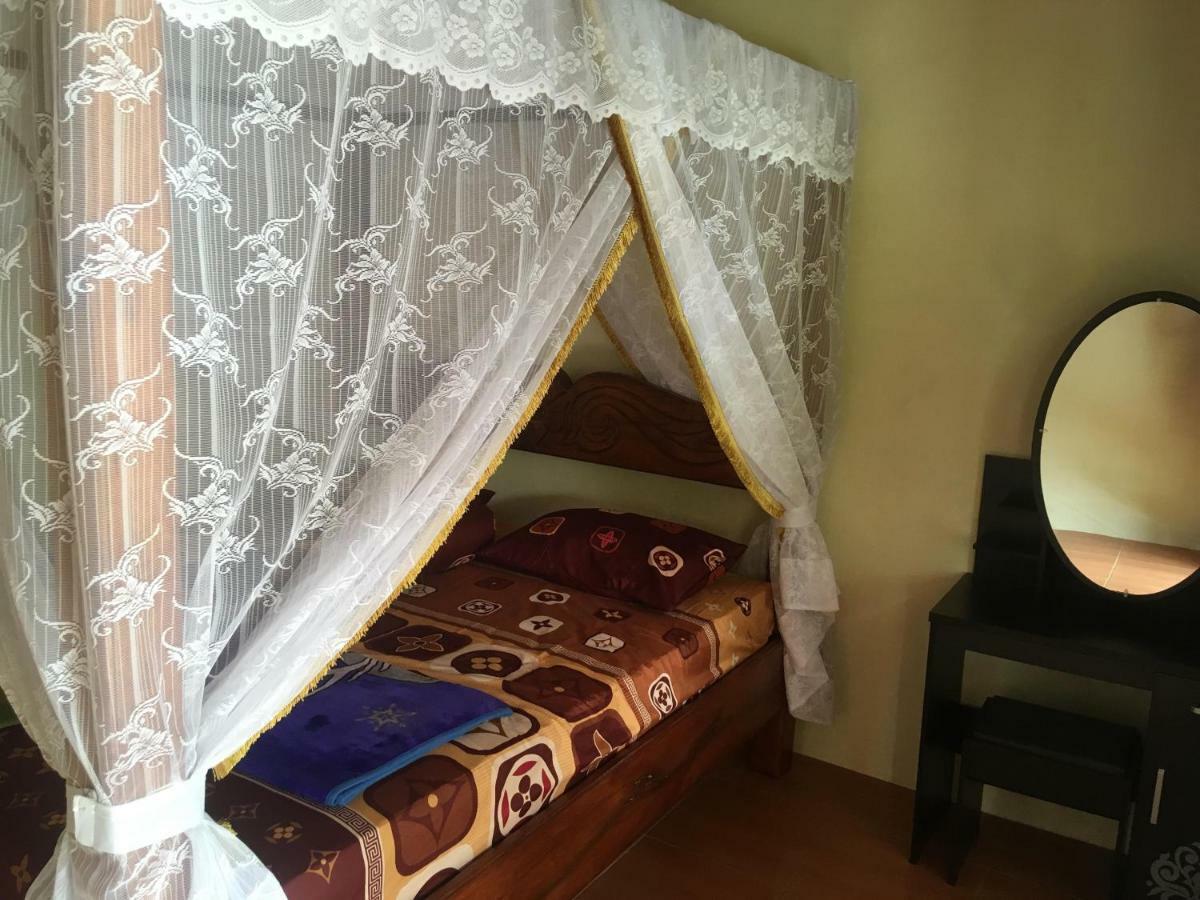 Sahnan Guest House Bukit Lawang Esterno foto