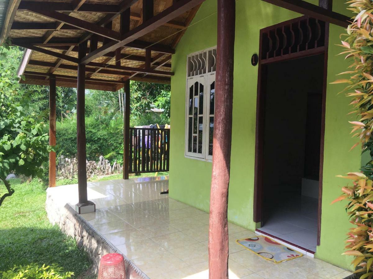 Sahnan Guest House Bukit Lawang Esterno foto